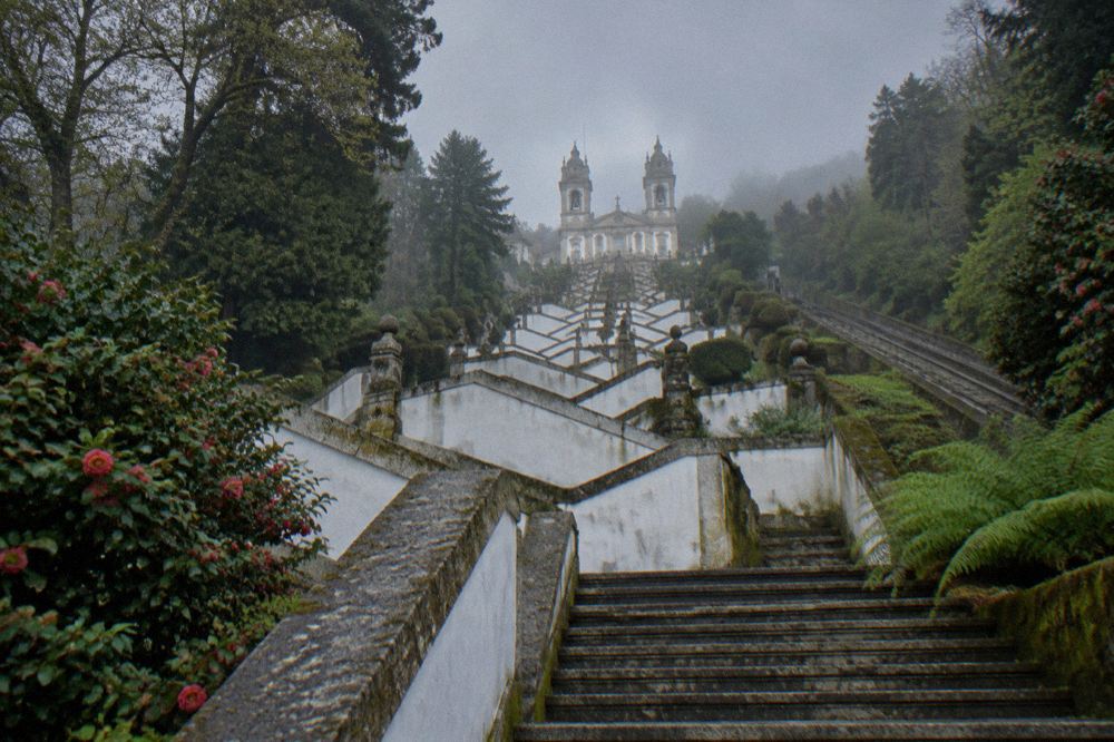 The baroque stairway and sanctuary of Bom Jesus do Monte seen from the gardens above Braga