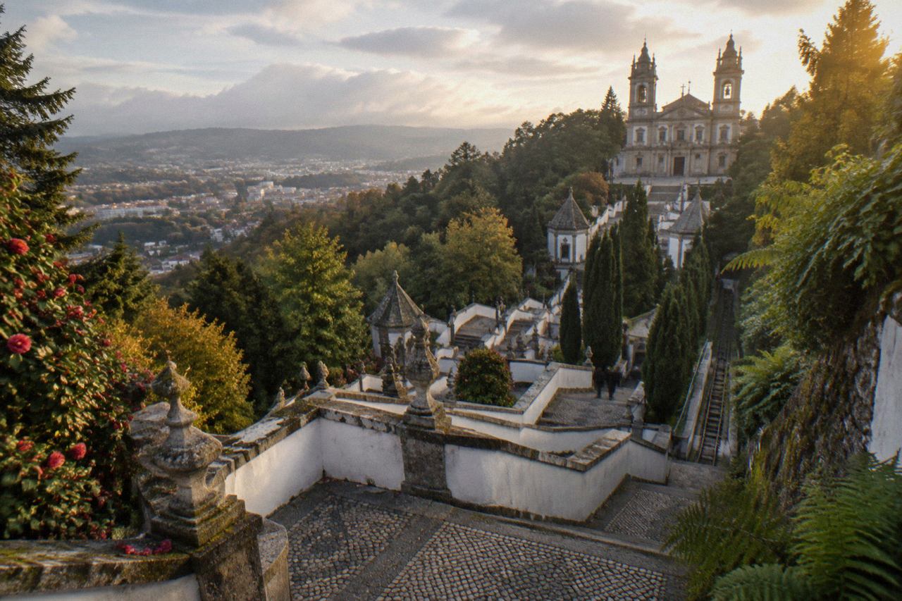 The Baroque stairway and sanctuary of Bom Jesus do Monte rising above the wooded hill above Braga