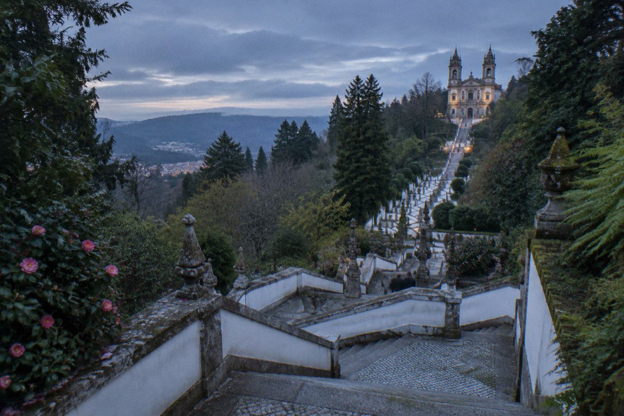 The baroque stairway of Bom Jesus do Monte rising toward the sanctuary above the wooded hills outside Braga