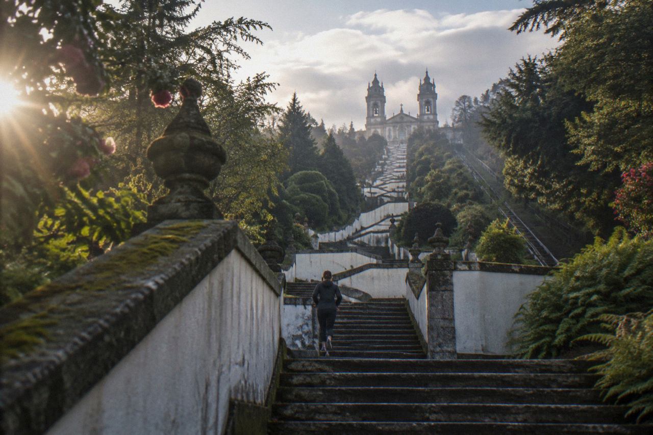 The baroque stairway and sanctuary of Bom Jesus do Monte rising above the wooded hill above Braga