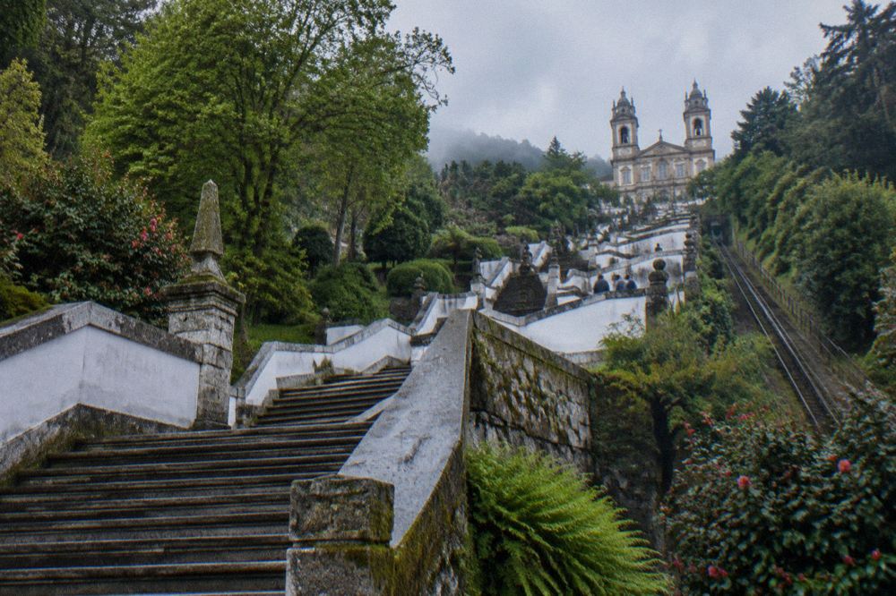 The zigzag baroque stairway of Bom Jesus do Monte climbing the hillside above Braga