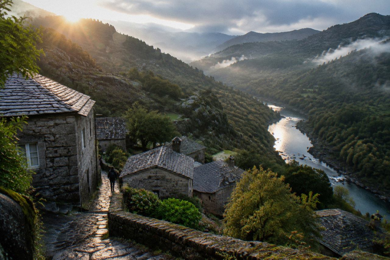 Wooded mountains and a river flowing through Peneda-Gerês National Park in northern Portugal