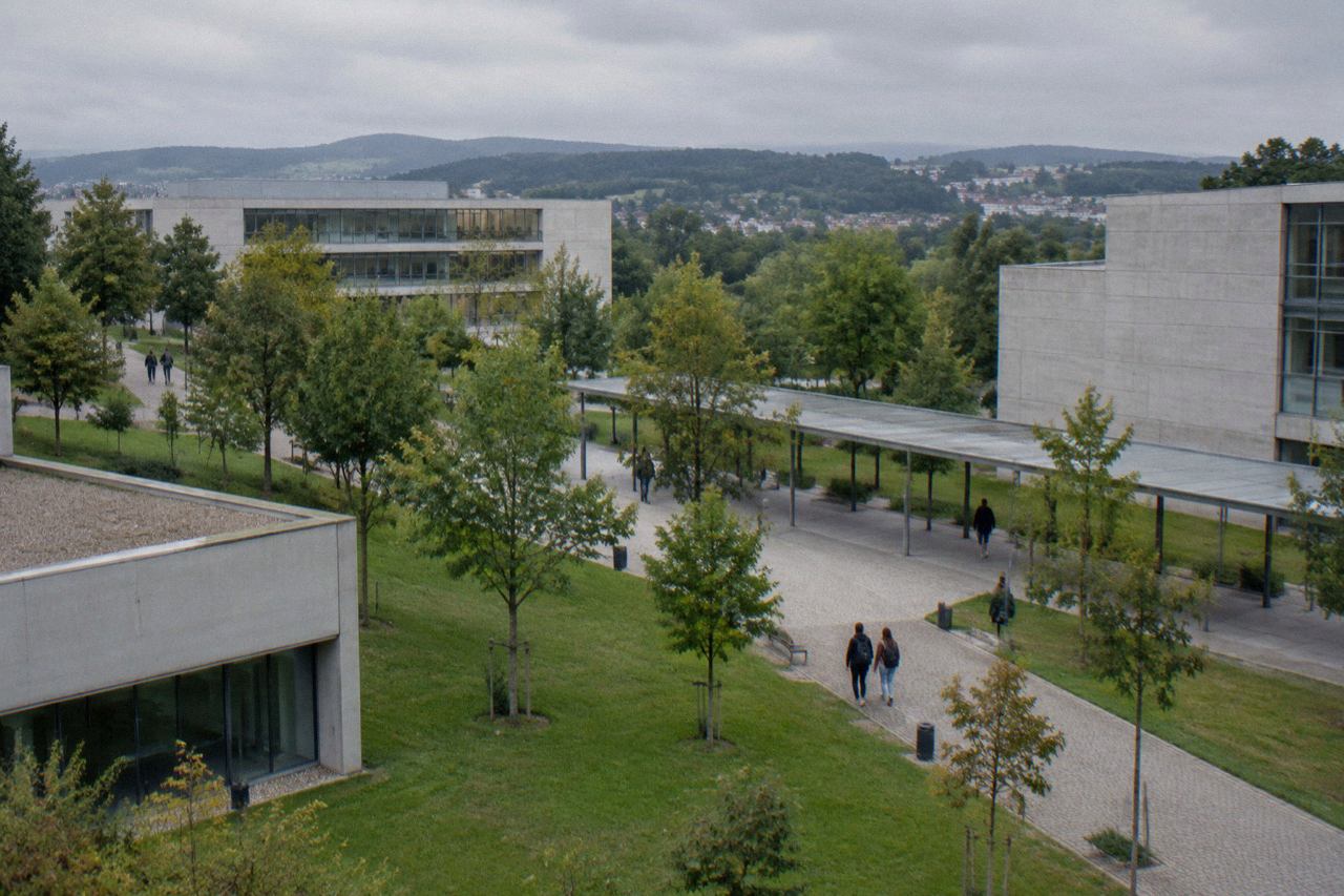 Modern university buildings and tree-lined paths on the Gualtar campus in Braga