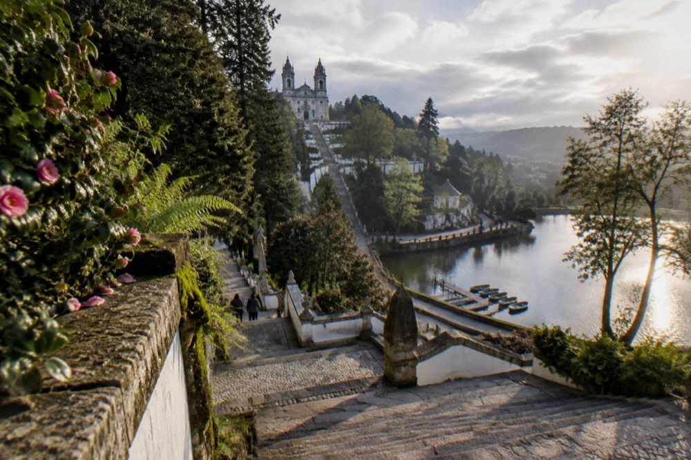 The lake in the gardens below the Bom Jesus basilica with rowing boats at a wooden jetty