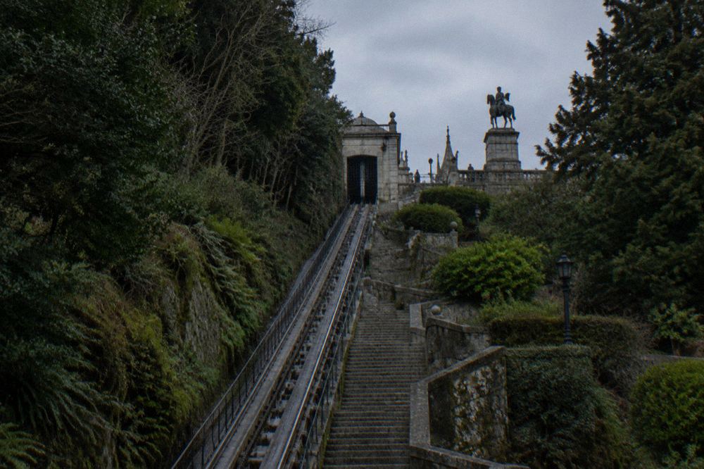 The upper station of the Bom Jesus funicular beside the equestrian statue near the sanctuary terrace