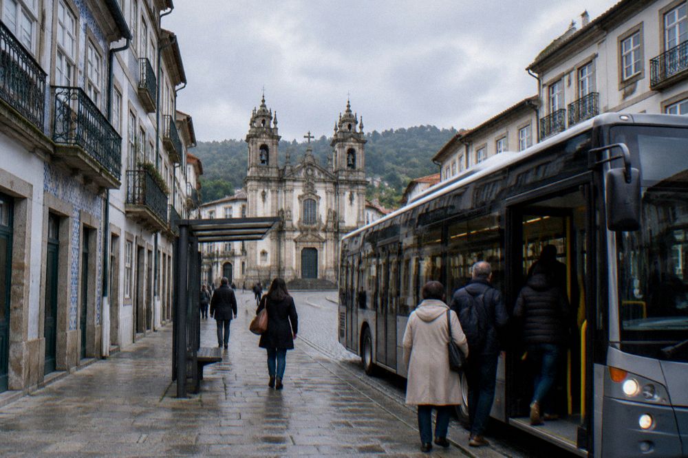 A city bus stopped at a street stop in Braga with passengers boarding