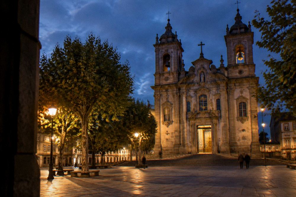 Evening light on a historic church façade and square in a northern Portuguese city
