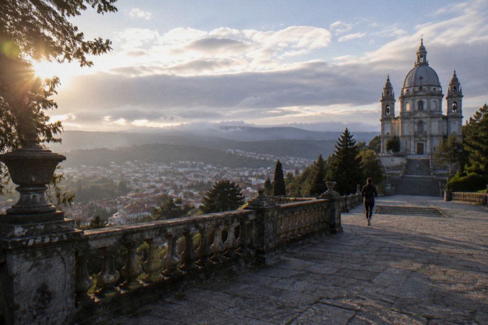 A stone balustrade and viewpoint at Sameiro overlooking the rooftops of Braga below