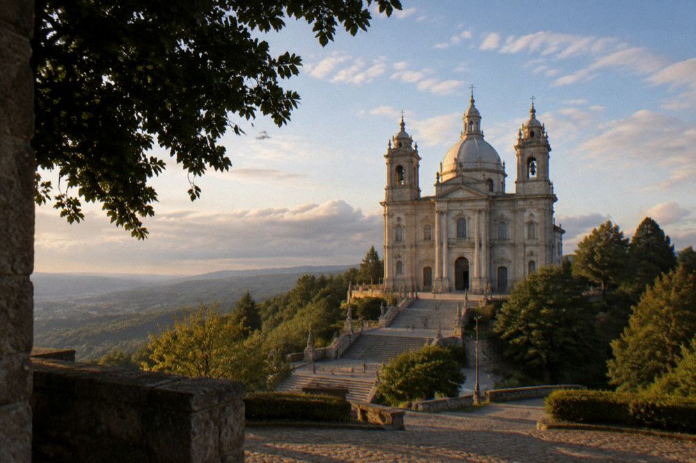 The stone facade and towers of the Sameiro basilica against a blue sky