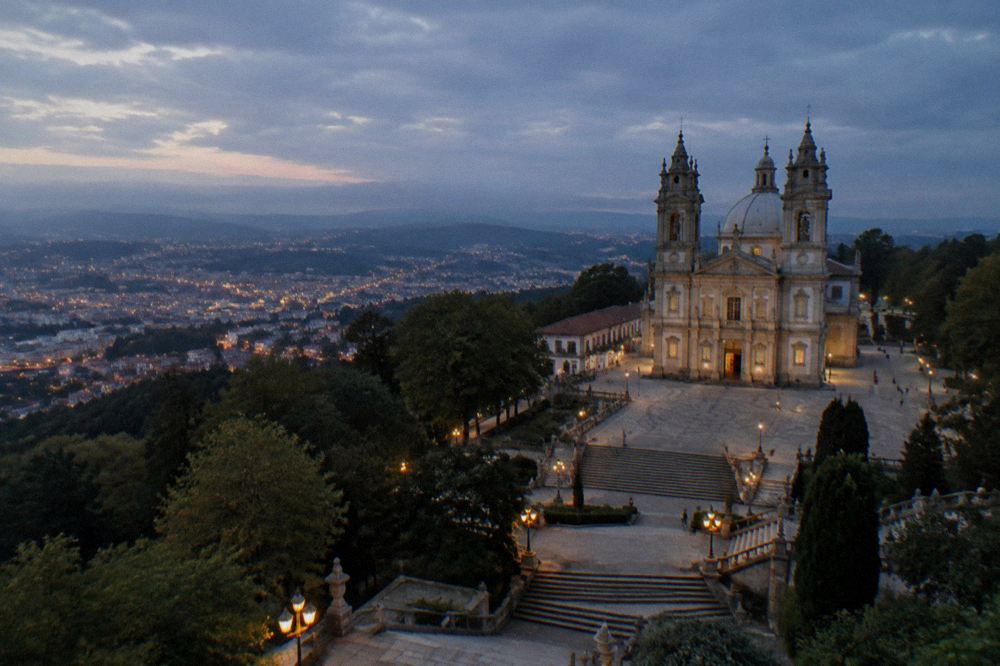 Evening light over the Sameiro esplanade with the city of Braga glowing below