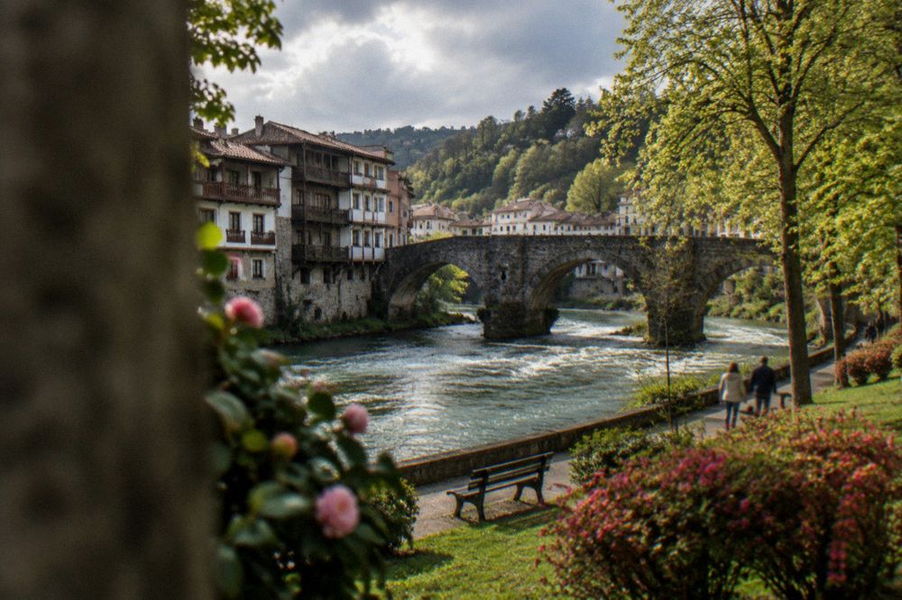Spring riverside park with green trees along the Tâmega in Amarante
