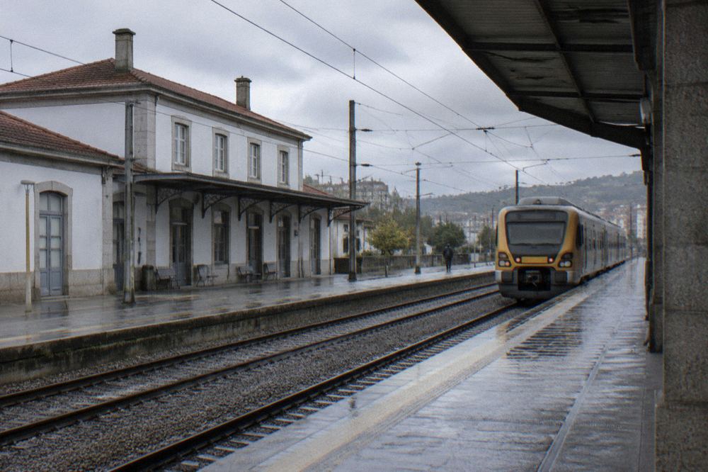 A regional train at a small station platform in northern Portugal