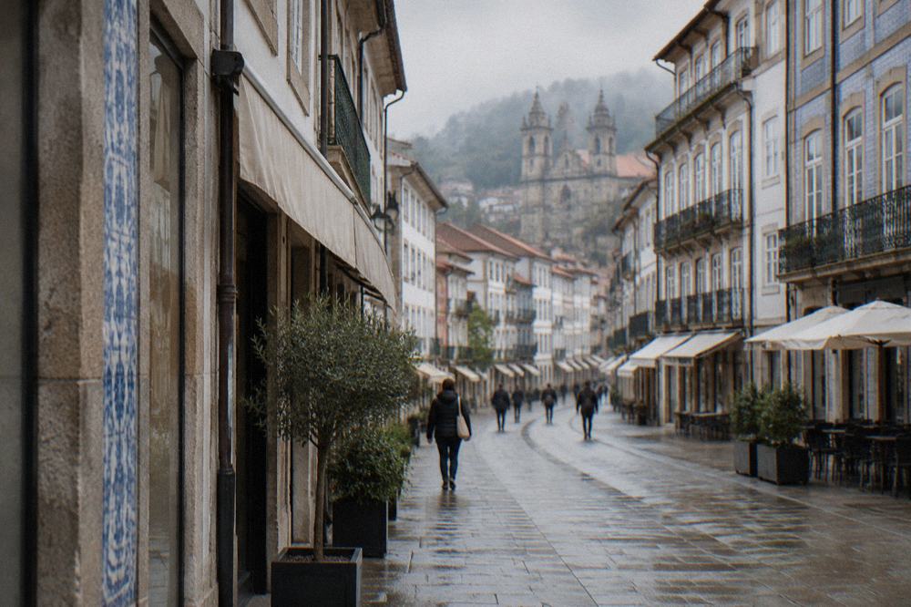 The pedestrian Rua do Souto in Braga's historic centre on a bright afternoon