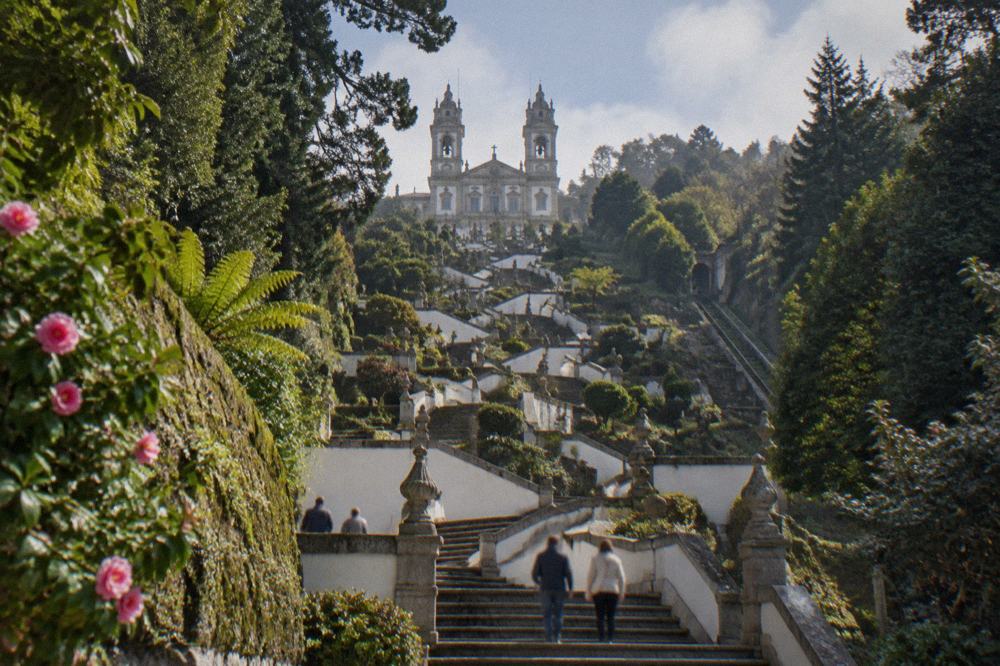 The zigzag baroque stairway of Bom Jesus do Monte rising through green terraces toward the basilica