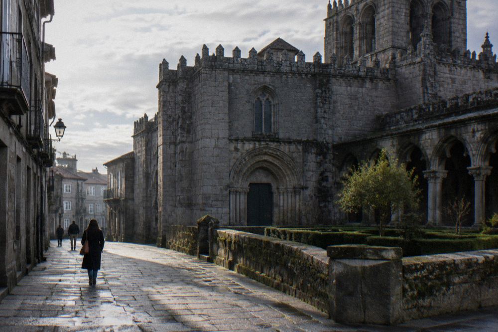Narrow street with granite buildings in Braga's historic centre near the cathedral