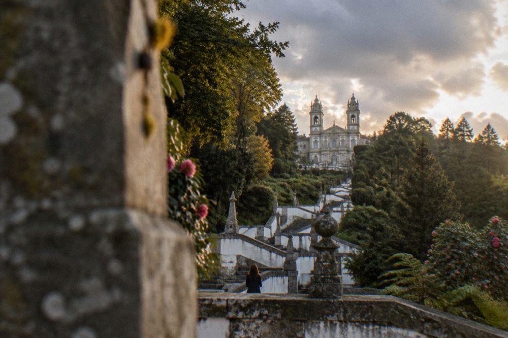 Basilica and gardens of the Bom Jesus sanctuary seen from a terrace at golden hour