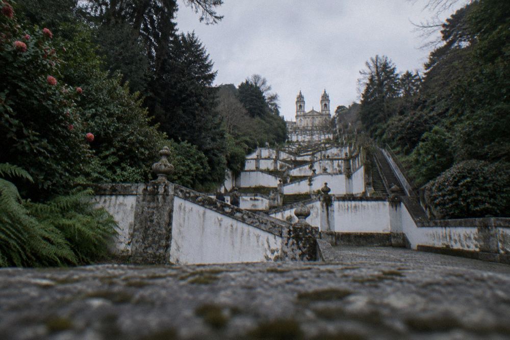 The baroque stairway of Bom Jesus do Monte rising through terraces toward the sanctuary above the tree line