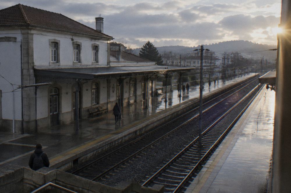 The interior of Porto Sao Bento station with its tiled walls and departure boards