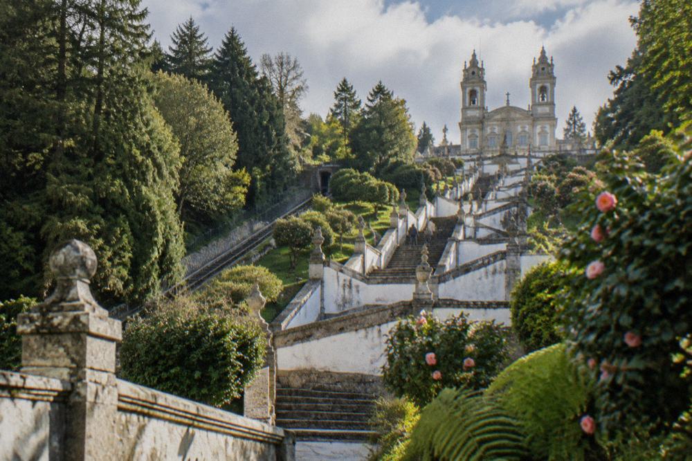 Baroque stairway and sanctuary of Bom Jesus do Monte seen from the gardens below