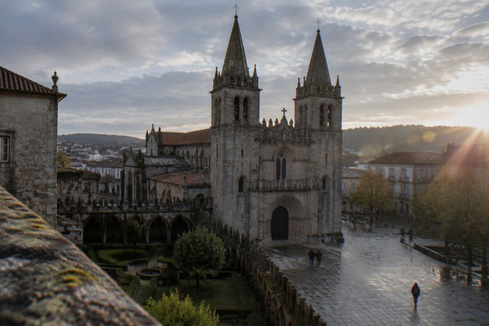 The twin-spired facade of the Sé de Braga cathedral seen from its square in the historic centre