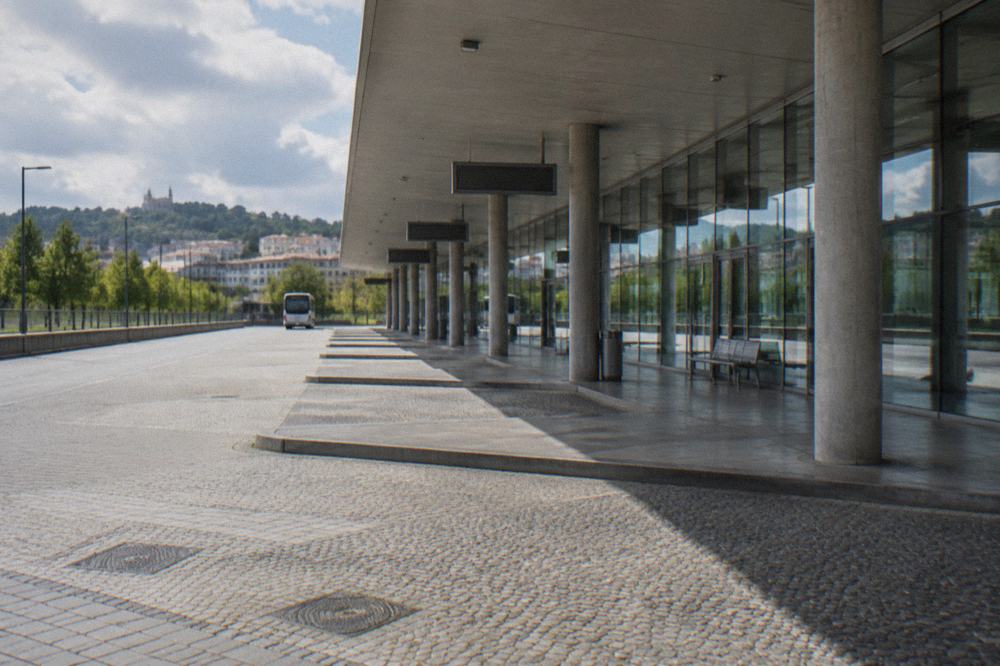 A regional bus parked at a modern intercity bus terminal in northern Portugal