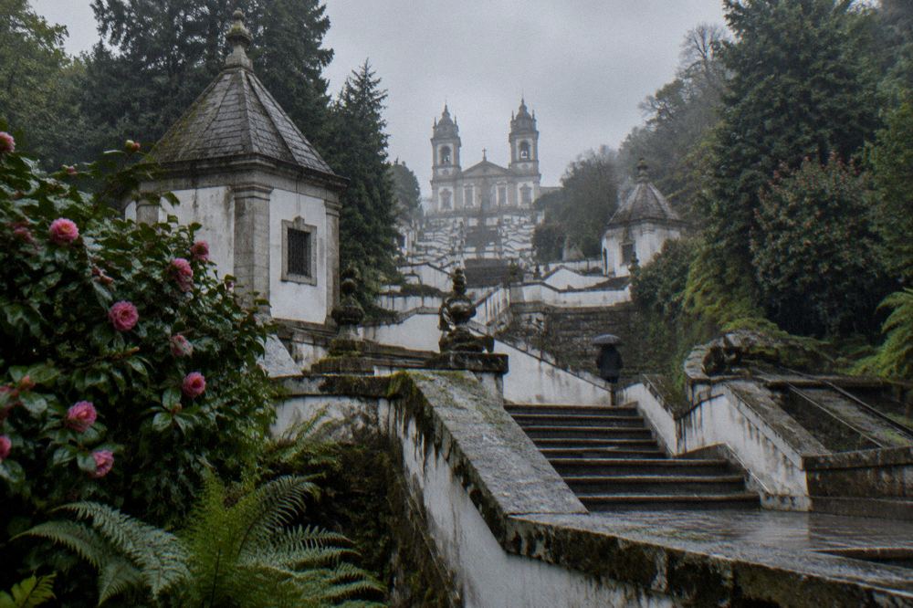 Rain falling on the granite stairway and baroque chapels of Bom Jesus do Monte sanctuary